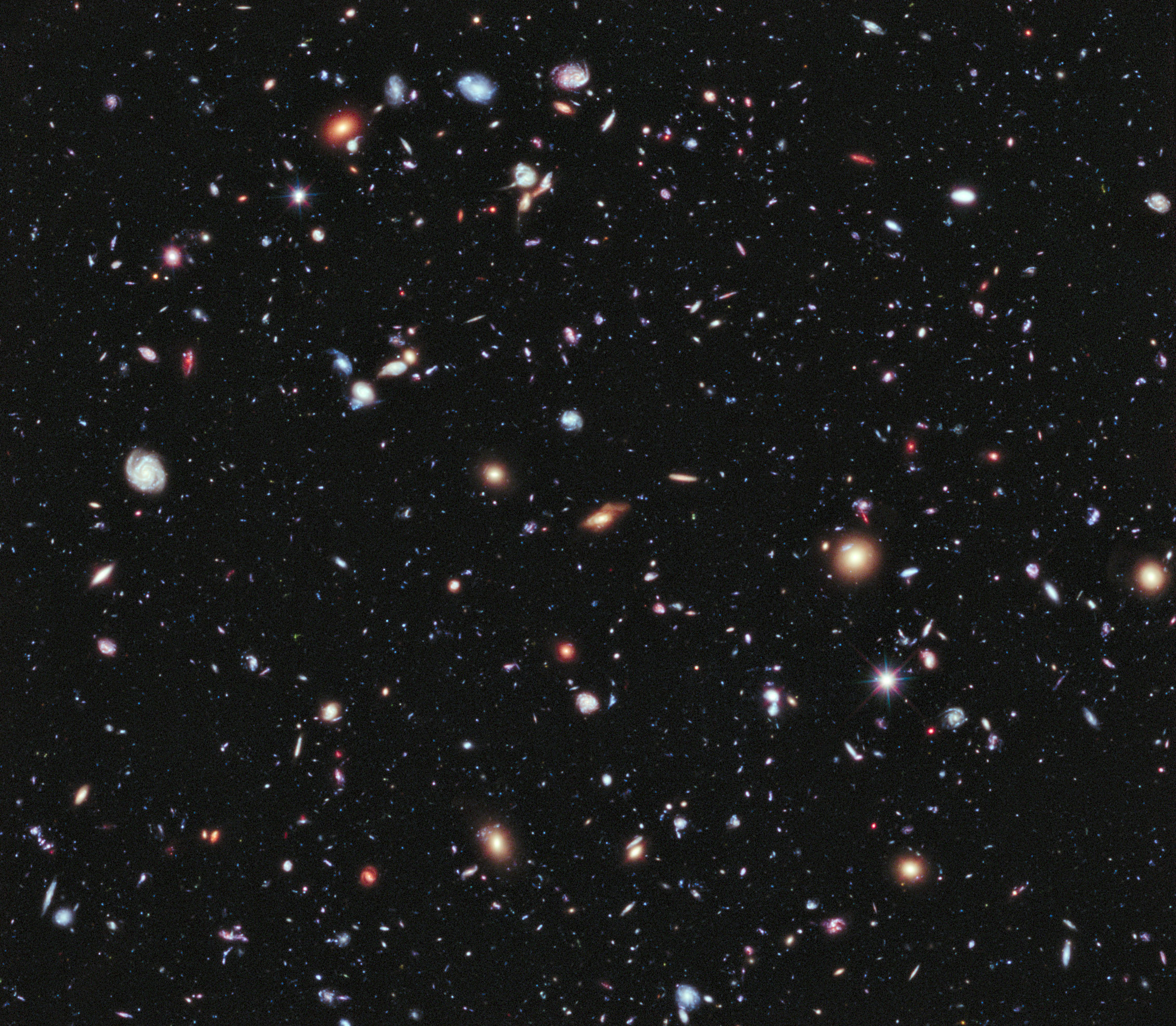 Image: A new, improved portrait of Hubble's deepest-ever view of the universe, called the eXtreme Deep Field, or XDF, in the constellation Fornax