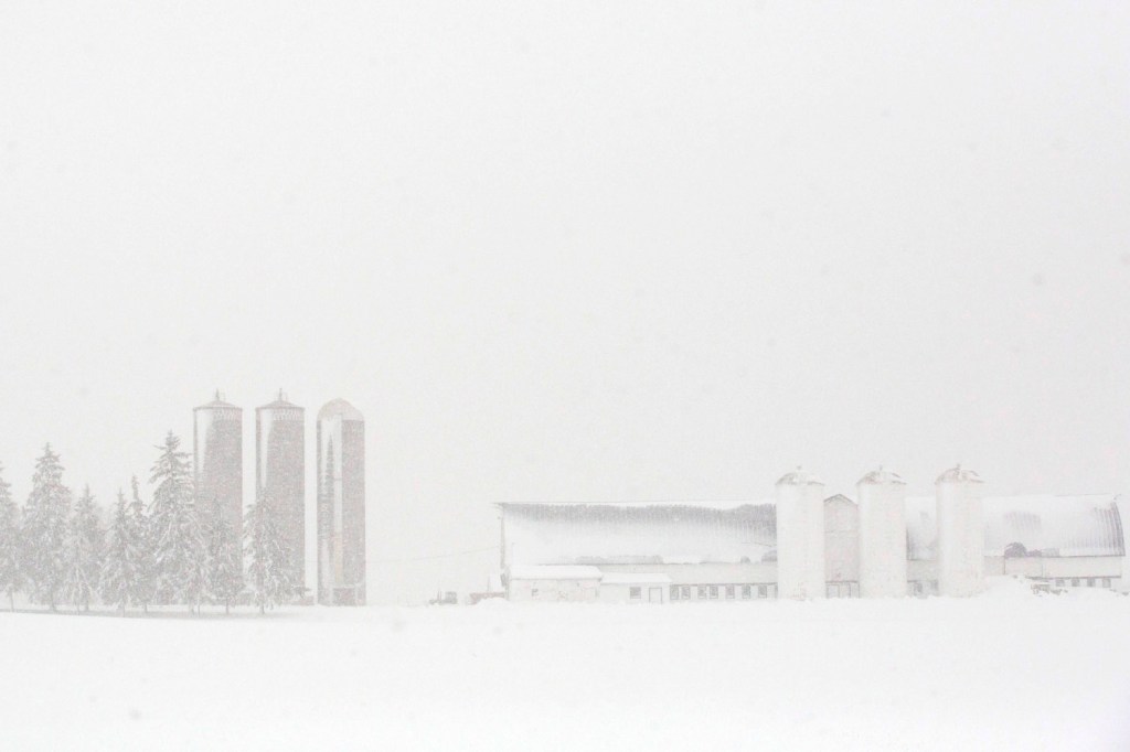 image: A snow covered farm is pictured in Waupun, Wis, Dec. 20, 2012.