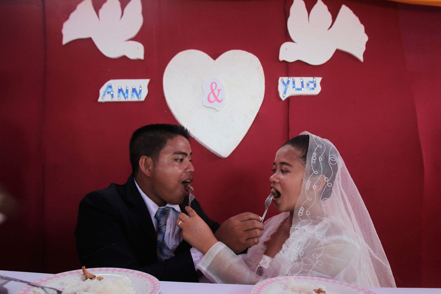 image: Ronnel Piligrino and Anna Marie Poblacion celebrates their wedding in Osmena town, Philippines.