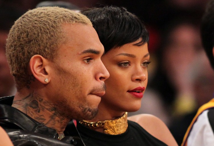 From left: Chris Brown and Rihanna attend the NBA game between the New York Knicks and the Los Angeles Lakers at Staples Center on Dec. 25, 2012 in Los Angeles.