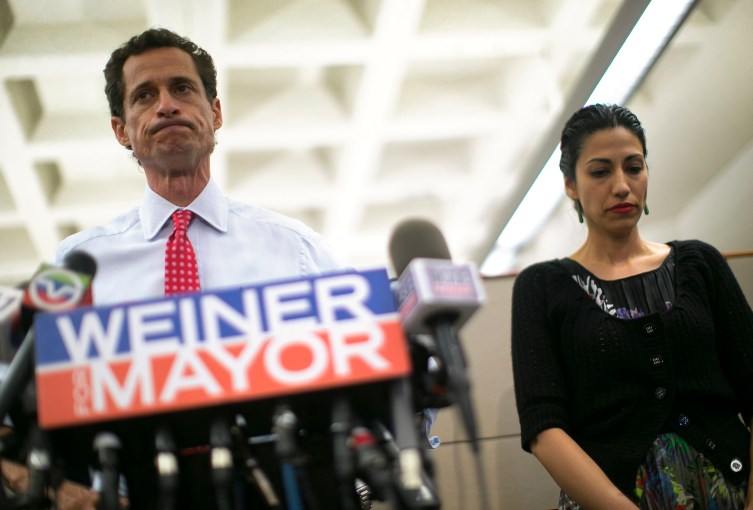 From left: Former New York mayoral candidate Anthony Weiner and his wife Huma Abedin attend a news conference in New York City, on July 23, 2013.