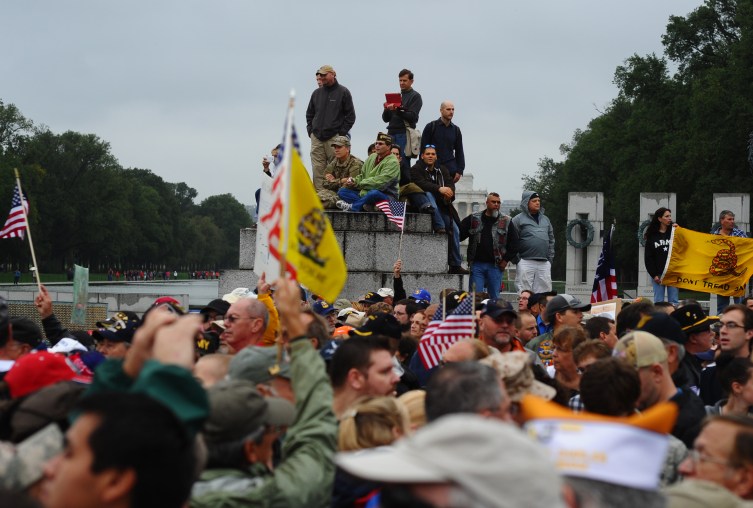 Protesters take part in a demonstration at the World War II memorial in Washington