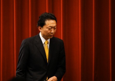 Japan's Prime Minister Yukio Hatoyama leaves a news conference in Tokyo