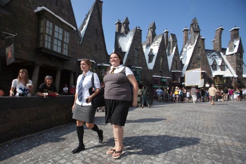 Guests tour the Wizarding World of Harry Potter theme park in Orlando, Florida