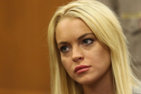 Lindsay Lohan reacts in court after arri