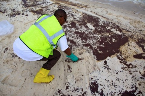 USA - Deepwater Horizon Disaster - Workers Clean Alabama Beach
