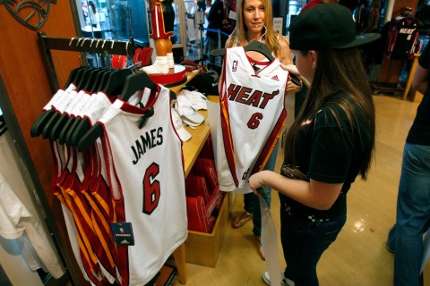 A guest purchases a LeBron James jersey at a store in Miami