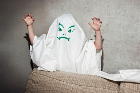 Little kid dressed as a ghost