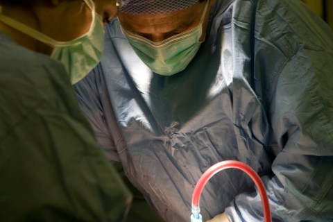 Surgeons performing a urology operation