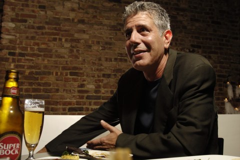 Chef Anthony Bourdain has a drink at Tintol restaurant in Ti