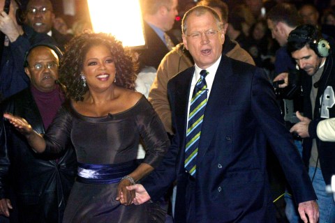 Talkshow host Winfrey is escorted by fellow talkshow host Letterman to opening night of Winfrey's Broadway play