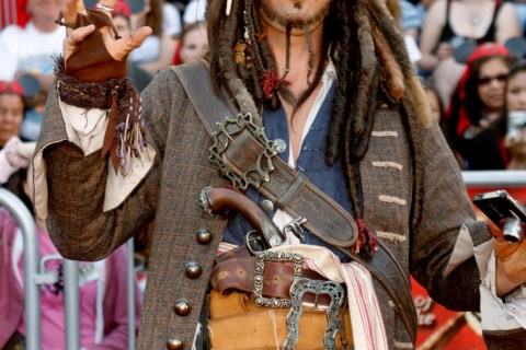 Guest dressed as character Captain Jack Sparrow arrives at the premiere of "Pirates of the Caribbean: At World's End" in Anaheim