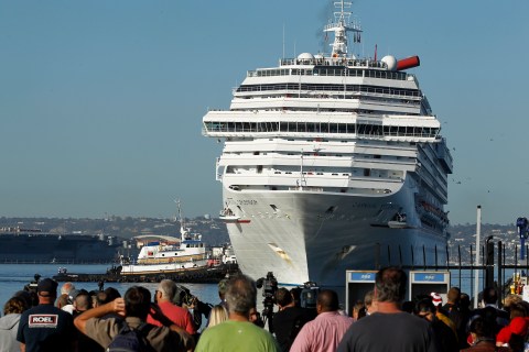 The Carnival Cruise Lines cruise ship C/V Splendor is pushed into dock after being towed to San Diego harbor