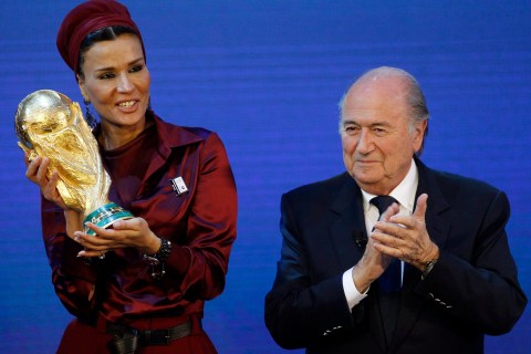 Sheikha Moza, wife of Qatar's Emir Sheikh Hamad stands next to FIFA President Sepp Blatter 