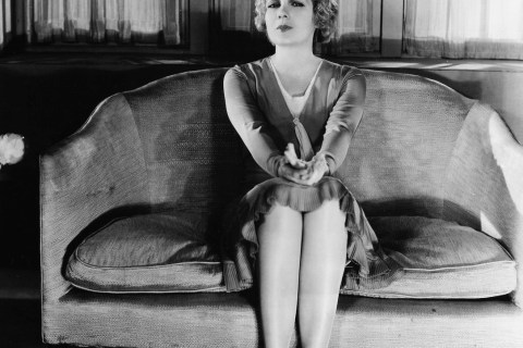 Actress Anita Page Sitting Under Mistletoe