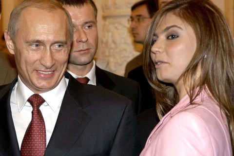 Russian President Vladimir smiles at former Russian gymnast Alina Kabayeva 