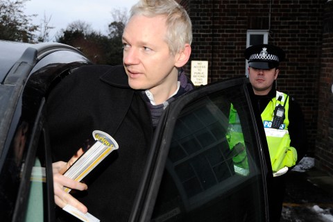 WikiLeaks founder Julian Assange gets into his car outside Beccles police station in Suffolk