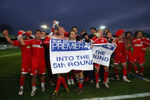 The Crawley team celebrate their 1-0 victory in the FA Cup against Torquay United 