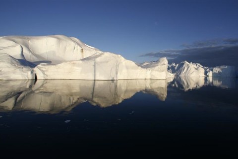 File photo of icebergs reflected in the calm waters at the mouth of the Jakobshavn ice fjord near Ilulissat