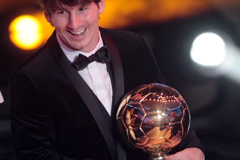Lionel Messi with the FIFA Ballon d'Or