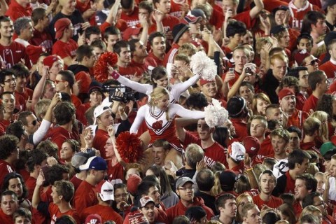 Thousands of students and players celebrate after the University of Wisconsin upset Ohio State 31-18