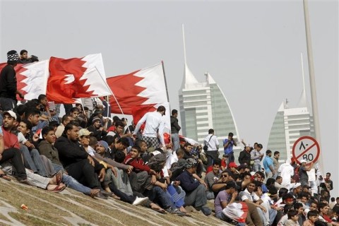Bahraini anti-government protesters take a rest from demonstrations in central Manama