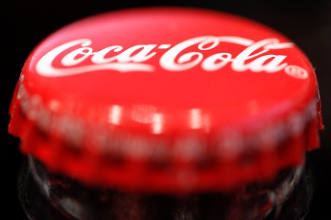 A logo is seen on a Coca-Cola bottle in Zurich