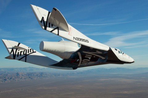 The Virgin Galactic SpaceShip2 glides toward Earth on its first test flight over Mojave, California