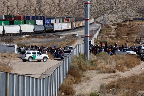 People gather on the border fence separating Mexico and the U.S. near Ciudad Juarez (REUTERS / Gael Gonzalez)