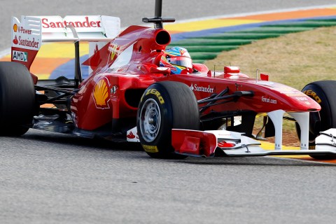 Ferrari Formula One driver Alonso of Spain drives his new F150 car during the first test session of the year in Valencia