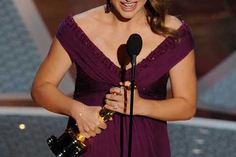 Actress Natalie Portman holds the trophy