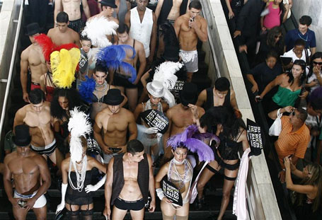 Models pose in their underwear at a bus station to celebrate the fifth annual Brazil Underwear Day in Brasilia