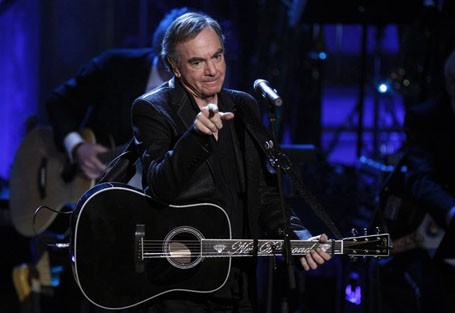 Singer Neil Diamond performs after being inducted during the 2011 Rock and Roll Hall of Fame induction ceremony in New York