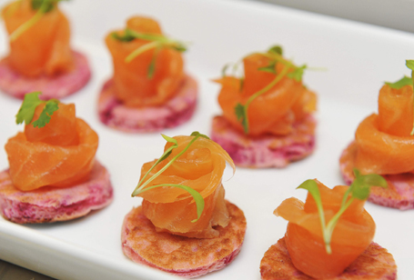 A platter of salmon canapes, akin to that which is usually served at receptions, are seen at Buckingham Palace in London
