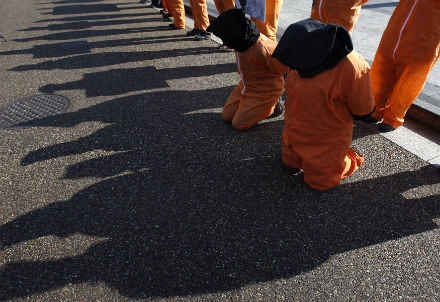 Protesters seeking the closure of the Guantanamo Bay detention facility demonstrate outside the White House in Washington