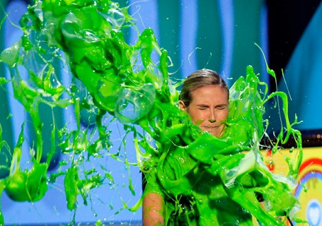 Presenter Heidi Klum gets slimed on stage at the 24th annual Nickelodeon Kids' Choice Awards in Los Angeles