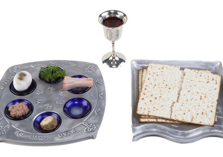 Seder plate, matzo and glass of wine