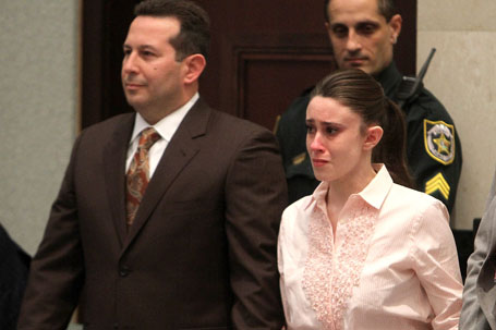 Casey Anthony (R) reacts to being found not guilty on murder charges at the Orange County Courthouse on July 5, 2011 in Orlando, Florida.  At left is her attorney Jose Baez (Joe Burbank / Getty Images)