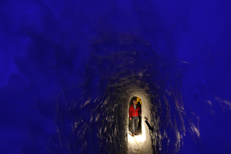 Discoverer Erler walks in the Natur Eis Palast (Nature Ice Palace) inside the Hintertuxer Glacier in the Austrian province of Tyrol