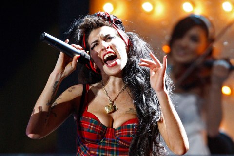 File photo of British singer Amy Winehouse performing at the Brit Awards in London