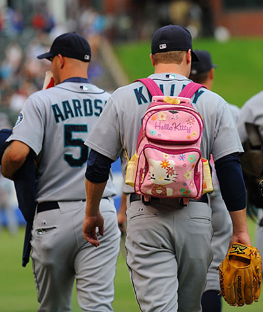 Pitcher in Pink: Baseball Rookies Wear Girly Backpacks as Part of