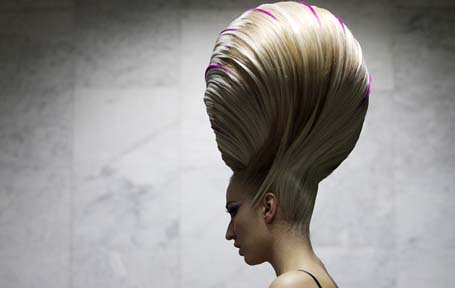 A model waits backstage before the Alternative Hair Show in Moscow?s Kremlin