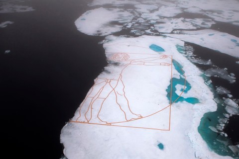 An aerial view shows Leonardo da Vinci's "The Vitruvian Man" recreated by artist John Quigley on the Arctic sea ice