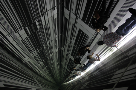 Visitors are reflected in mirrors at the installation "Environment 3" by artist Luc Peire at the Art Gallery Auckland