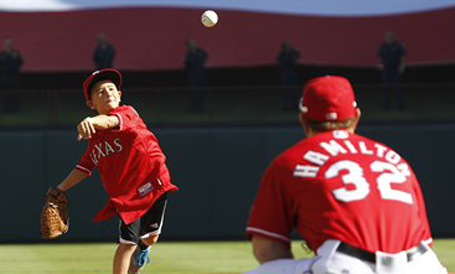 5-year-old adopted through Buckner throws out first pitch at Texas Rangers  game · Foster Care and Adoption · Buckner International