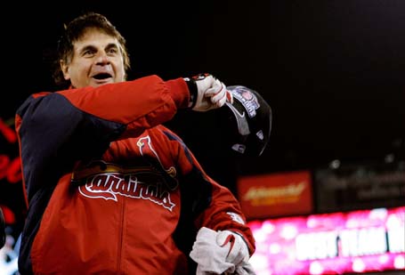 St. Louis Cardinals manager Tony La Russa and wife Elaine walk to