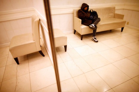A customer sleeps at Macy's department store in New York