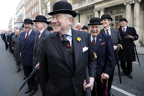 Members of the In and Out club, one of London's oldest private members clubs, laugh in London