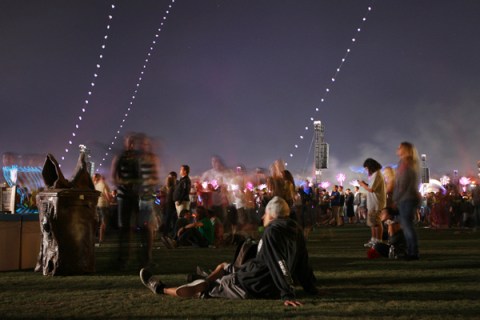 People watch a performance on the last night of the Coachella Valley Music and Arts Festival in Indio