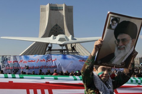An Iranian boy with drone model